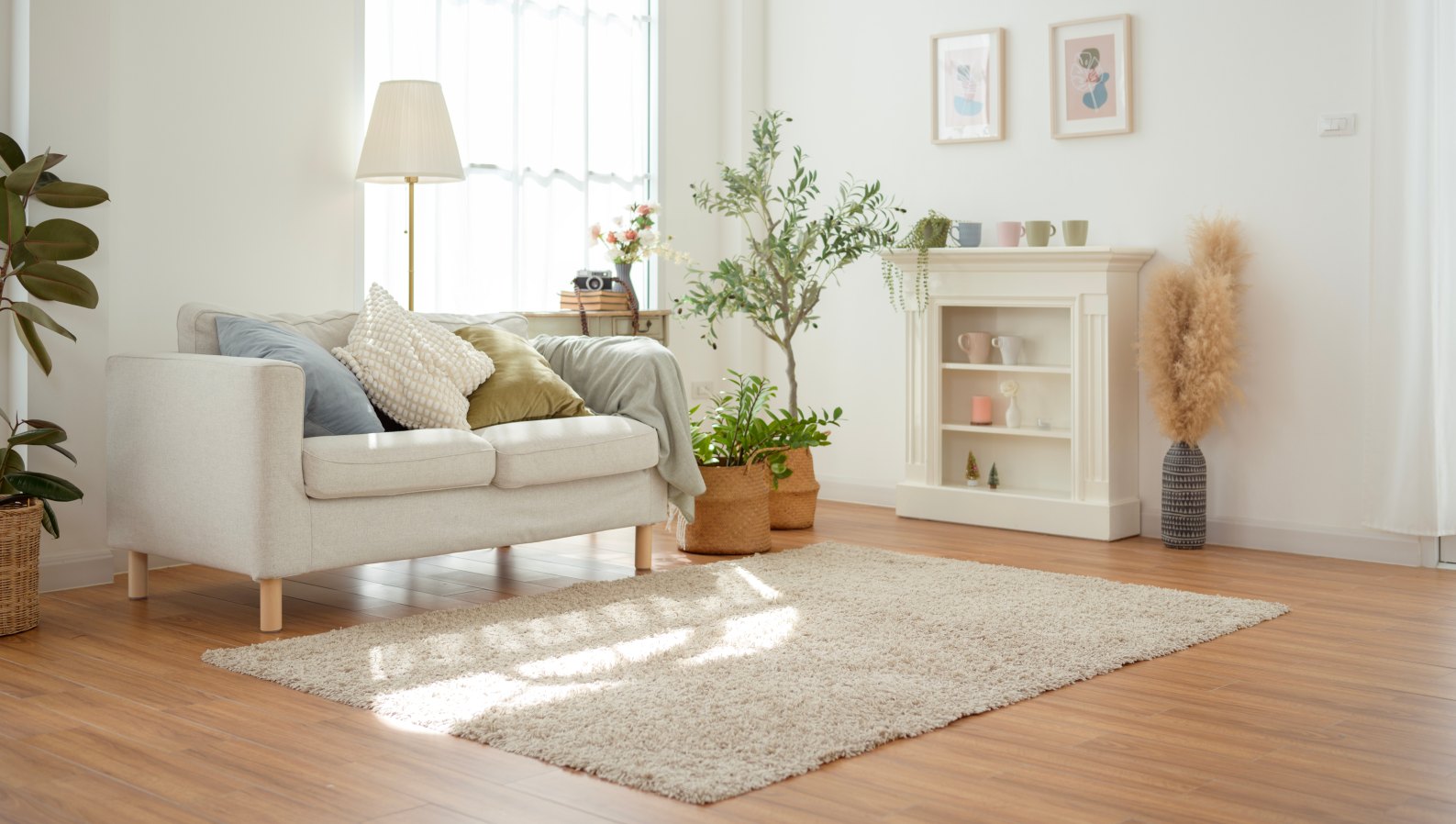 A clean, tidy, sunlit living room kept comfortable at home